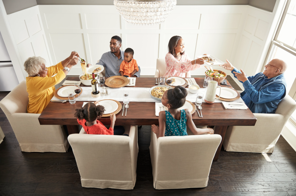 Family having breakfast at the dining table | A & S Carpet Collection