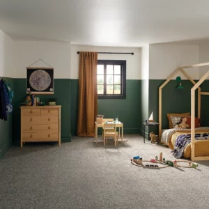 Gray Shaw Floors carpet in a warm colored kids bedroom | A & S Carpet Collection