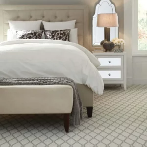 White and gray patterned carpet in a bedroom | A & S Carpet Collection