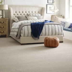 Cream colored Shaw Floors carpet in a contemporary bedroom | A & S Carpet Collection